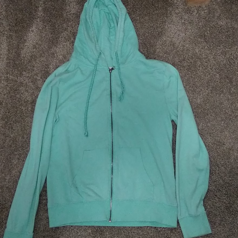 Beautiful green colored zip up hoodie NWOT